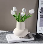 Good-looking, simple ceramic flower vase. Ideal for dining table centerpieces and home decorations. A stylish home acces — photo 15