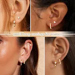 Conjunto de brincos femininos de moda com quatro estrelas de oito pontas e zircônias incrustadas, para um visual elegante e moderno. — foto 4