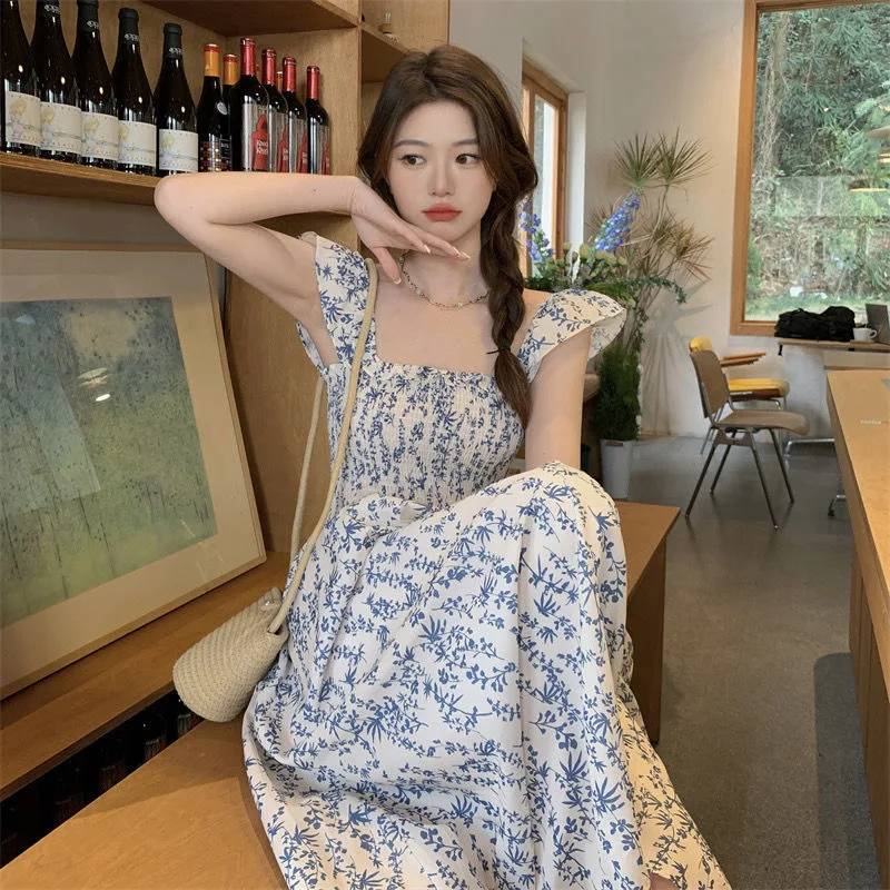 Blauwe bloemen slipdress vakantiejurk met vliegende mouwen — foto 3