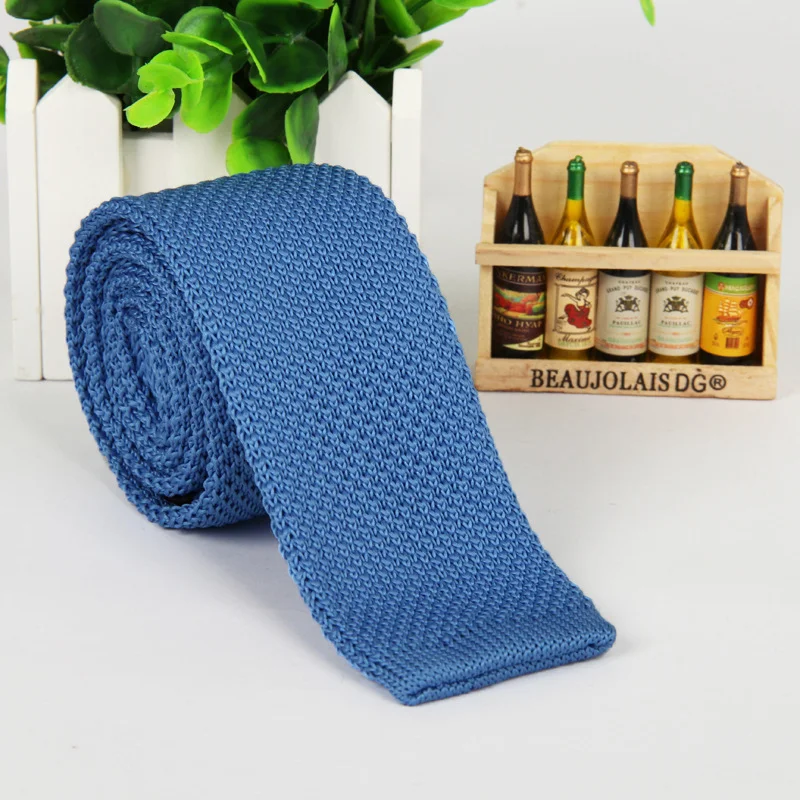 Title 19, Mens solid-color knitted tie. Elevate your sty...
