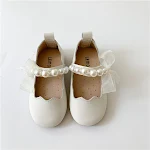 Scarpe da principessa per bambina con suola morbida, perla e fiocco. Perfette per occasioni speciali, comode ed eleganti. — foto 8