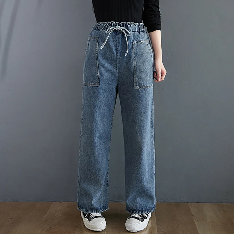 Loszittende en veelzijdige jeans met hoge taille voor dames in grote maten. Rechte pijpen, comfortabel en stijlvol voor elke dag. — foto 3