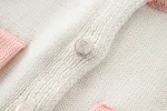 Terno de duas peças com jaqueta de tricô e alças. Combine estilo e conforto com este conjunto perfeito para qualquer evento. Sinta-se confiante e chique. — foto 35