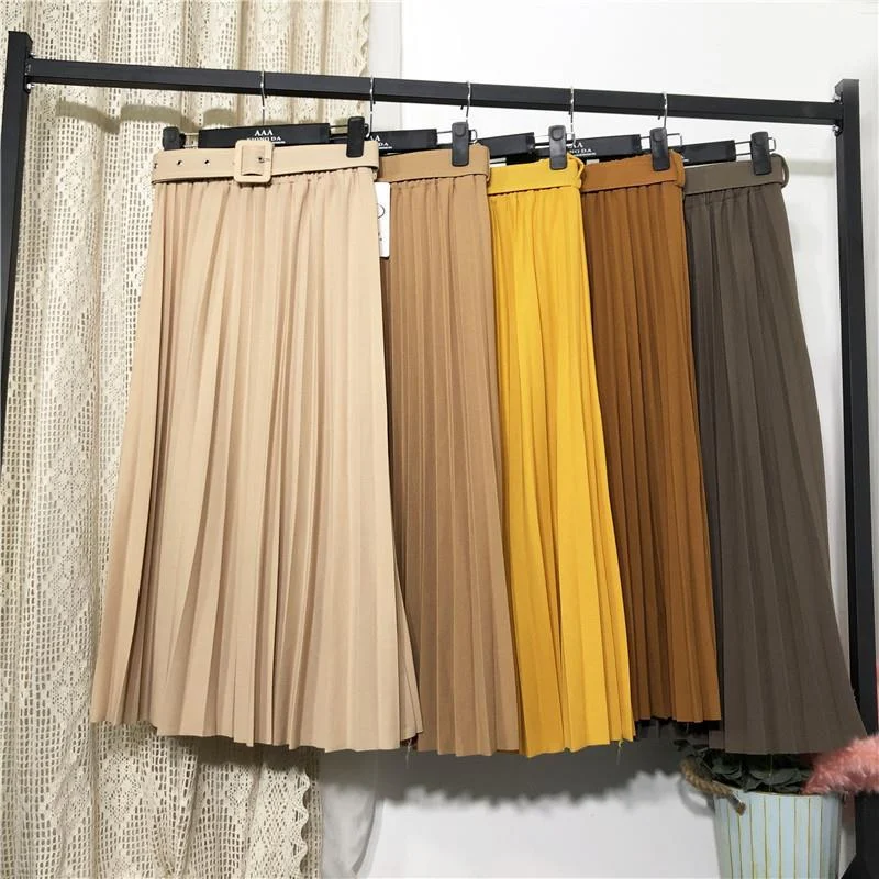 Saia plissada com cinto de cor sólida, perfeita para um visual elegante e sofisticado. Ideal para diversas ocasiões. — foto 10