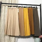 Saia plissada com cinto de cor sólida, perfeita para um visual elegante e sofisticado. Ideal para diversas ocasiões. — foto 10