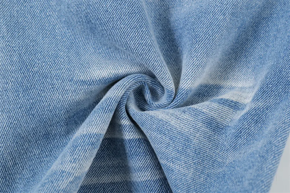 Title 14, Light-colored Inkjet Gradient Jeans offer a uni...
