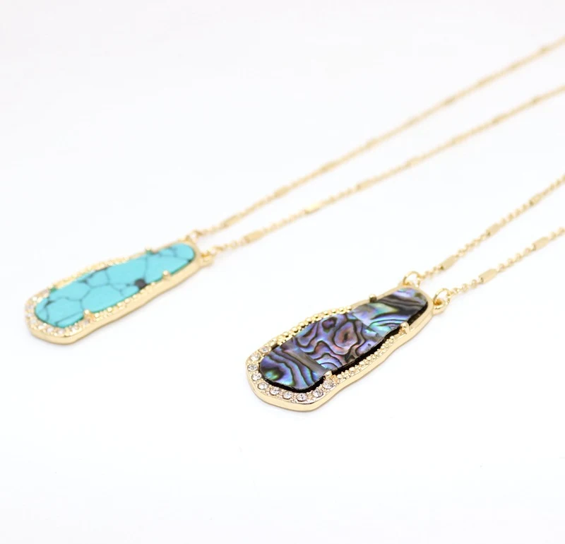 Colar longo com incrustações de concha de abalone, um toque de sofisticação e beleza natural. Adicione este colar deslumbrante à sua coleção. — foto 1