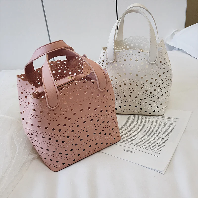 Title 4, Bolsa tiracolo bucket com design versátil de um...