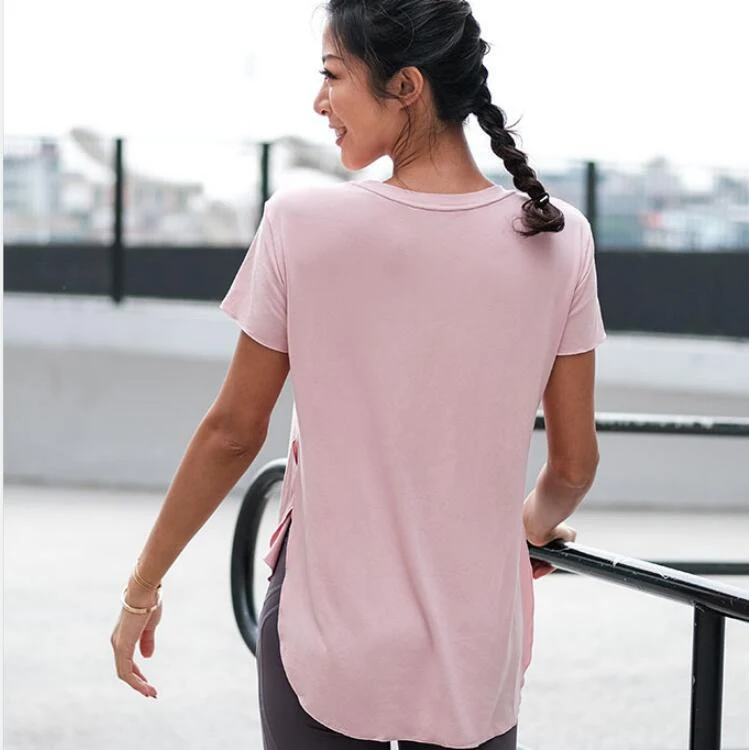 Camiseta feminina fitness wear de manga curta com top elástico solto — foto 1