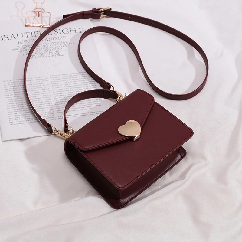 Peach Heart Lock One Shoulder Crossbody Bag – A stylish and practical bag with a unique heart-shaped lock, perfect for e — photo 4