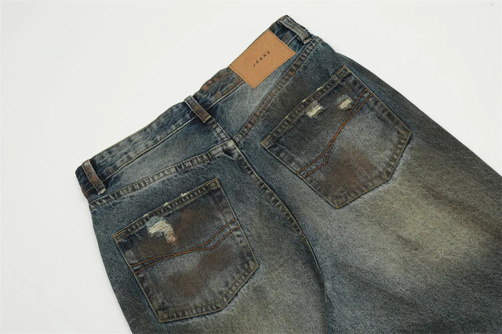 Heavy Industry Ripped Dirty Jeans for Men, providing rugged style and comfort. Durable denim for a tough, worn look perf — photo 13