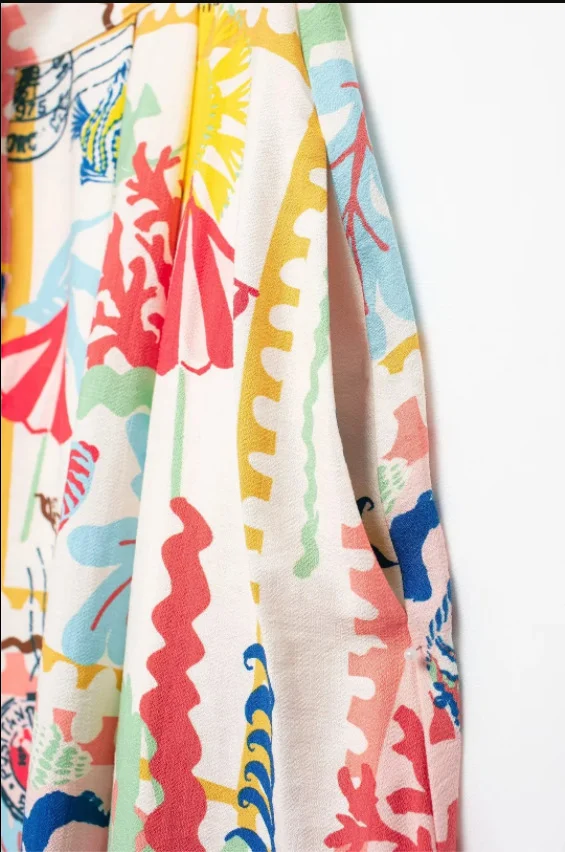 Top de verão feminino com estampa patchwork e saia com capa estampada. Conforto e estilo para os dias quentes, leve e elegante. — foto 16