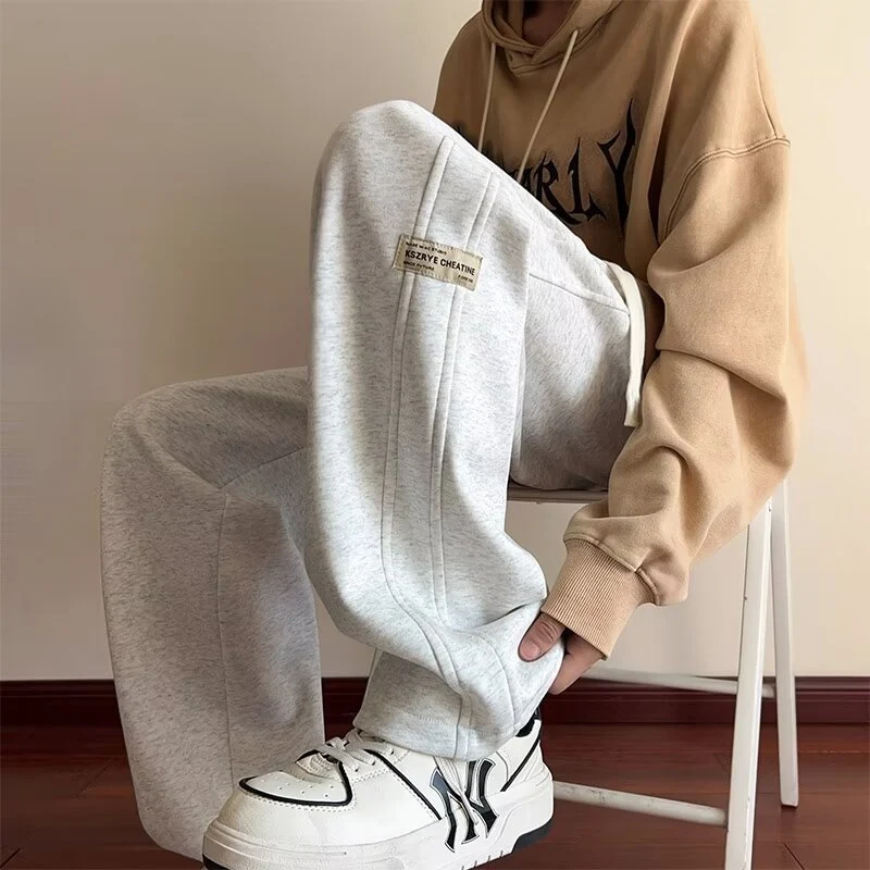 Calças Esportivas Casuais Retas Soltas Estilo Americano Masculinas Conforto e Liberdade para Atividades e Uso Diário Design Moderno e Ajuste Perfeito — foto 2