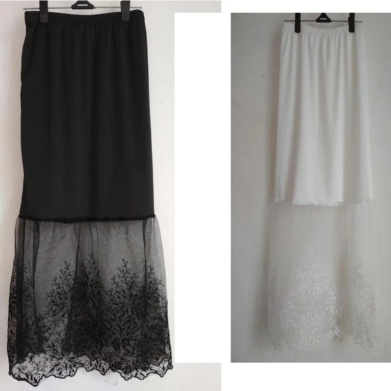 Saia longa de tela de renda. Sofisticação e leveza para mulheres. Perfeita para um visual elegante e confortável. Saia longa com caimento impecável. — foto 3