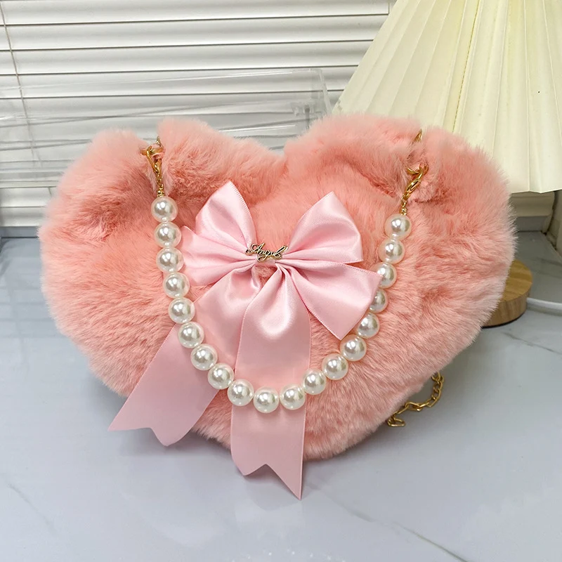 Bolsa pequena feminina transversal com laço, ideal para mulheres que buscam praticidade e elegância. Perfeita para carregar seus itens essenciais com estilo. — foto 4