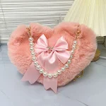 Bolsa pequena feminina transversal com laço, ideal para mulheres que buscam praticidade e elegância. Perfeita para carregar seus itens essenciais com estilo. — foto 4