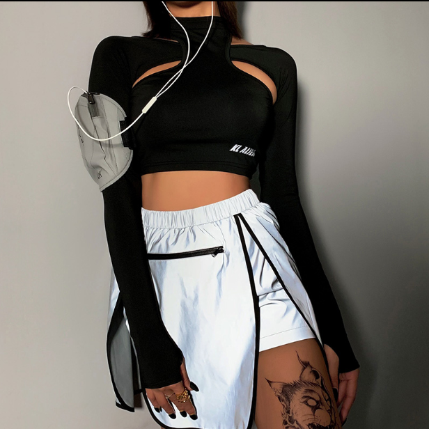 Saia com fenda refletiva feminina. Seja vista com segurança e estilo, ideal para corridas noturnas e eventos com pouca luz. — foto 3