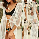 Strandnet geborduurde blouse, perfect voor een zomerse look. Ideaal voor dagen aan het strand of in de zon. Draagt heerlijk luchtig. — foto 1