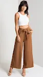 Women's high waist cropped trousers with strap wide leg, creating a stylish and comfortable look, perfect for everyday w — photo 2