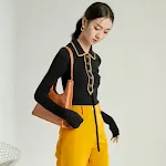 Blusa de punto vintage de manga larga para mujer, ajustada, con colores contrastantes y un ajuste favorecedor. Ideal para un look elegante. — foto 4