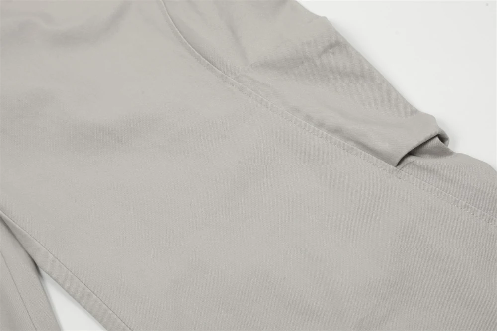 Men's pleated trousers with back leg zipper decorations. Modern fit, stylish design, and unique details for a comfortabl — photo 1