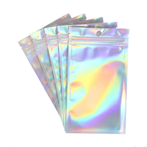 Title 10, Embalagem de 20 sacos plásticos holográficos de...