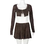 Terno feminino com saia plissada e gola quadrada, ideal para um visual elegante e profissional. Perfeito para o escritório ou eventos. — foto 7