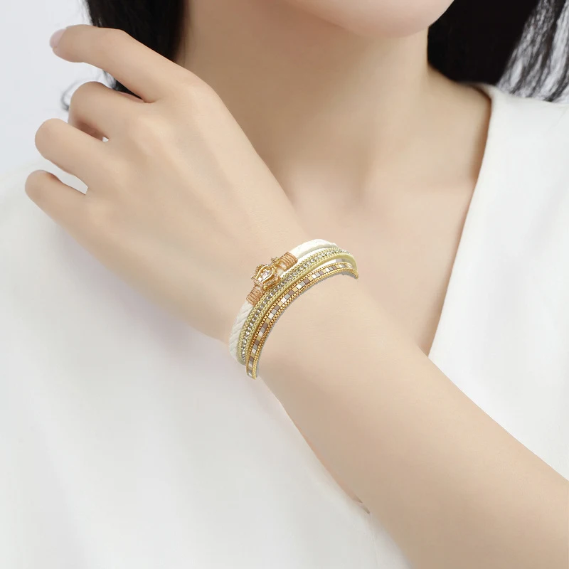 Pulseira feminina de couro com coroa, acessório de moda elegante. Adicione um toque de realeza ao seu visual com esta pulseira charmosa. — foto 3