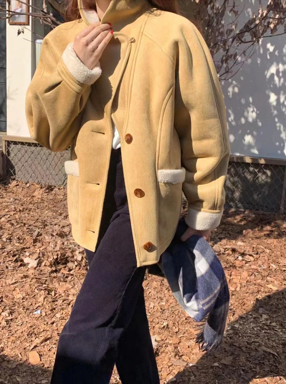 Title 15, Maillard Reverse Lamb Wool Coat offers warmth a...